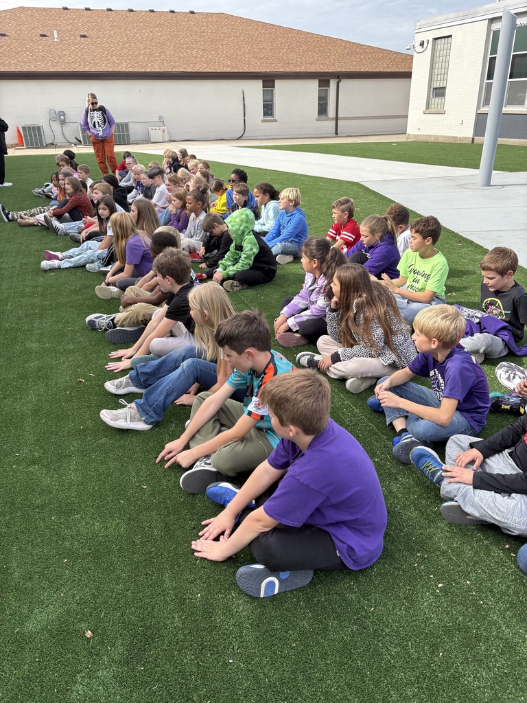 Kids sitting and learning 