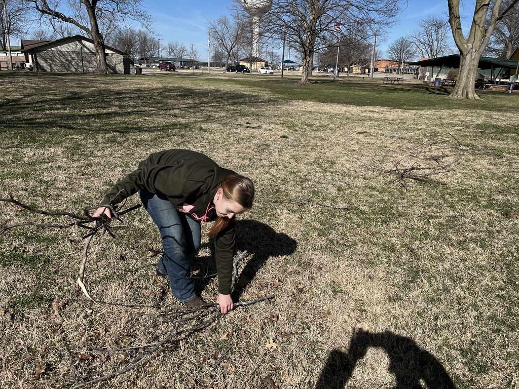 Cadet Cooksey picking up trash