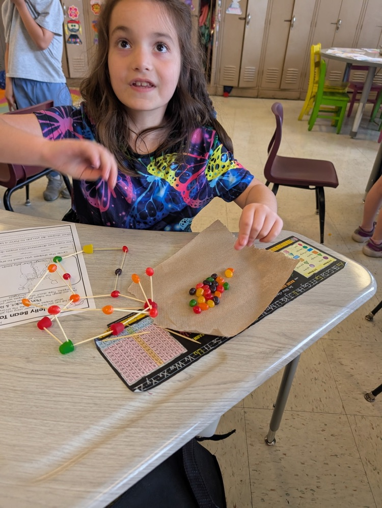 girl using jellybeans to make a creation
