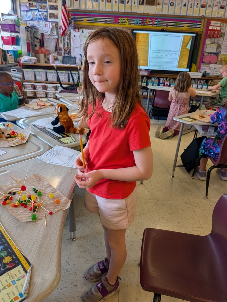 girl using jellybeans to make a creation