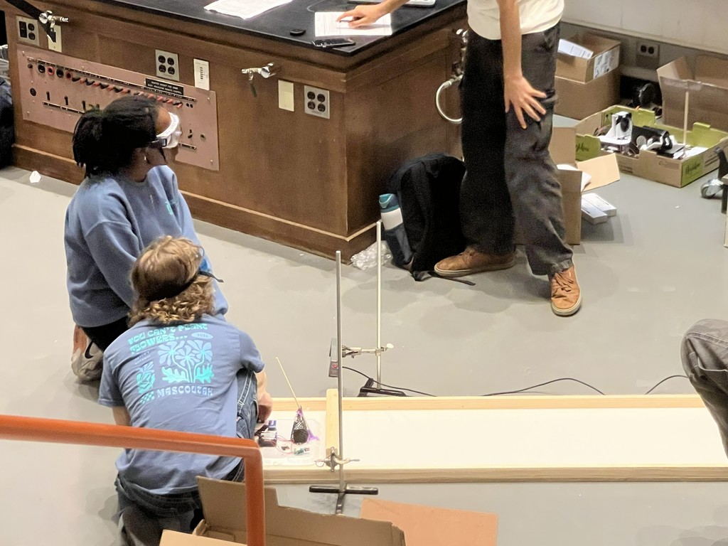 Neema and Es competing in the Hovercraft competition in Loomis Hall.