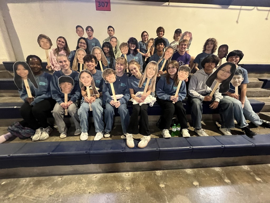 We had "big heads" made to cheer each other on during the Science Olympiad competition. University of Illinois 2026! Now you can see who is holding the sign!