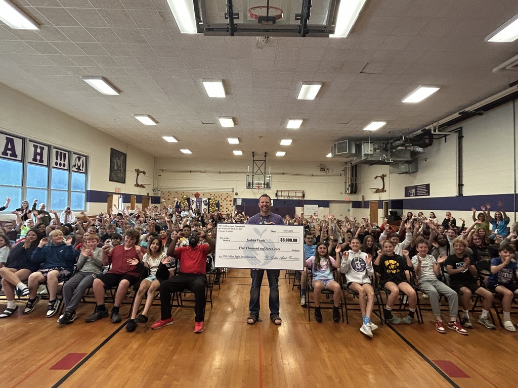 MES celebrates Josh Veath for his Golden Apple Excellence in Teaching award