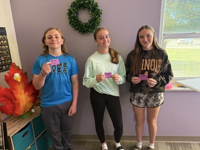 Students holding tribe tickets