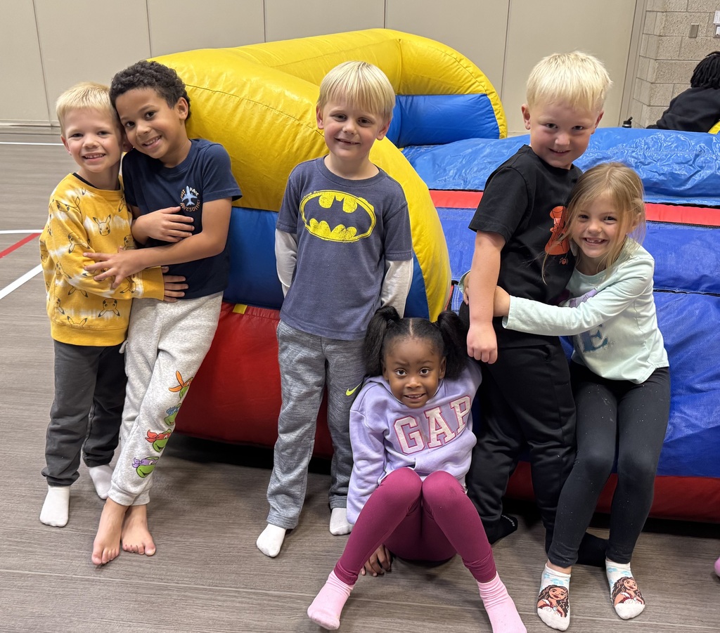 Wingate students enjoying the inflatables reward party