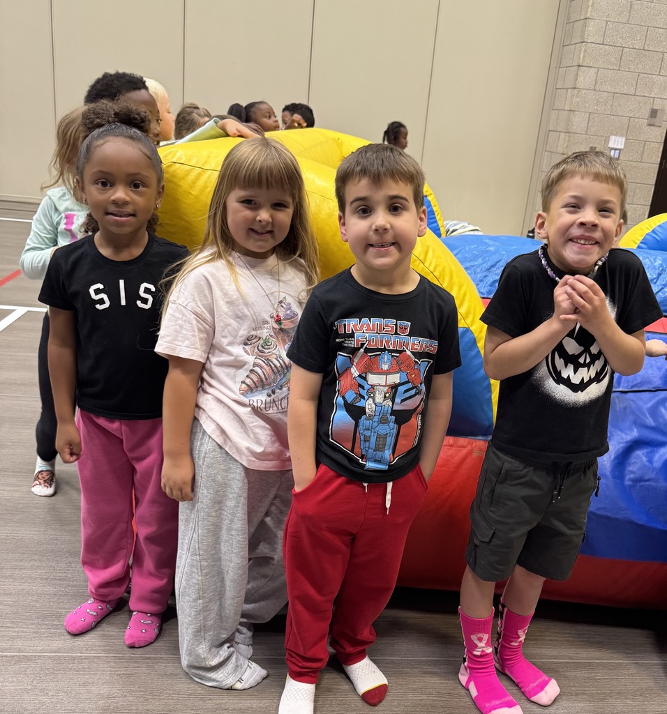 Wingate students enjoying the inflatables reward party