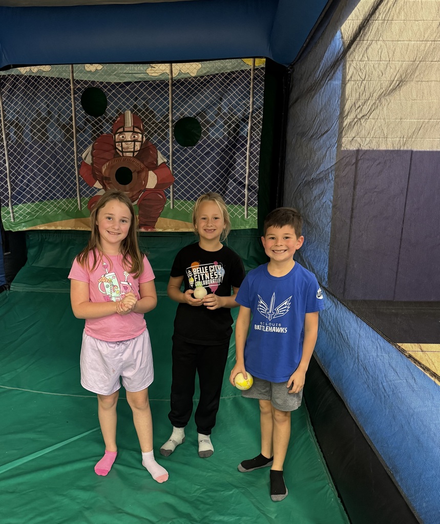 Wingate students enjoying the inflatables reward party