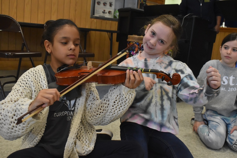 Lockhart grade 3 students testing a variety of instruments