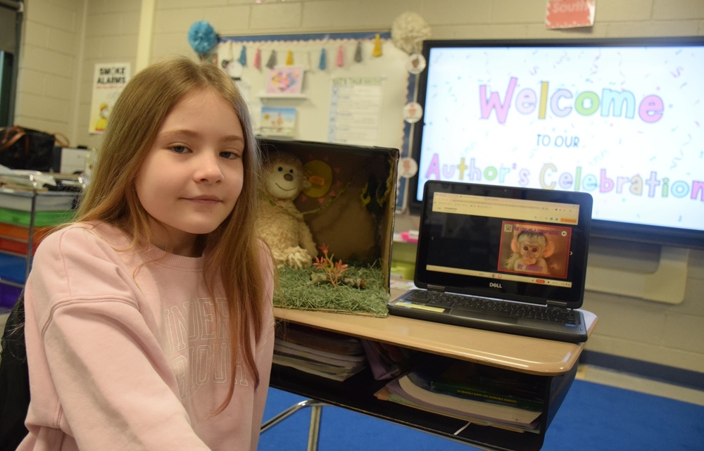 Birch Lane student participating in Gallery Walk project