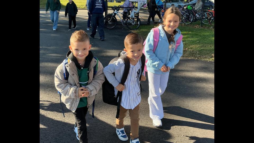 Students walking to school for National Walk, Bike and Roll Day