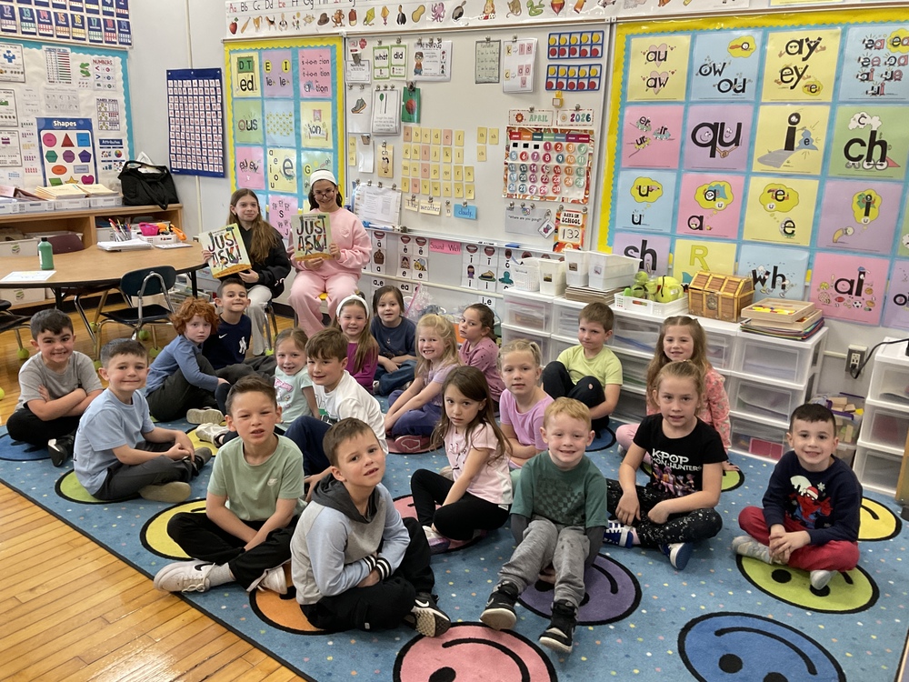 Best Buddies read "Just Ask" to Kindergarten