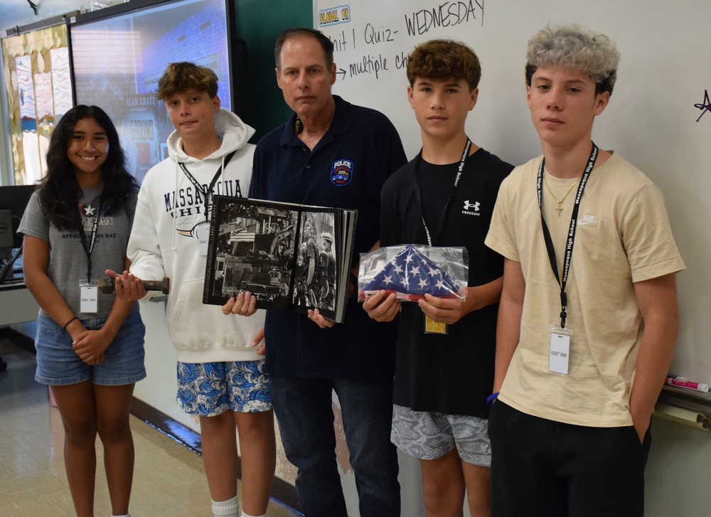 Ames security guard Steve Miller sharing artifacts from the twin towers
