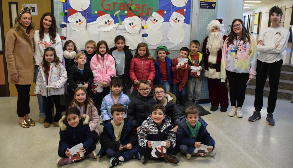 Elementary students tour ames campus door decorating annual event