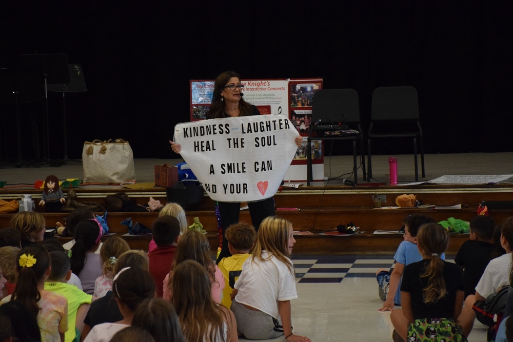 Birch Lane students participating in a book assembly