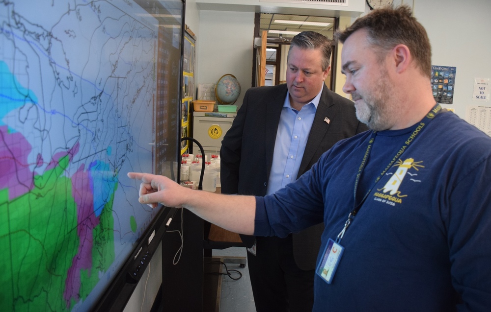 Dr. Brennan and Nick Donahue, Ames scince teacher and  resident meteorologist