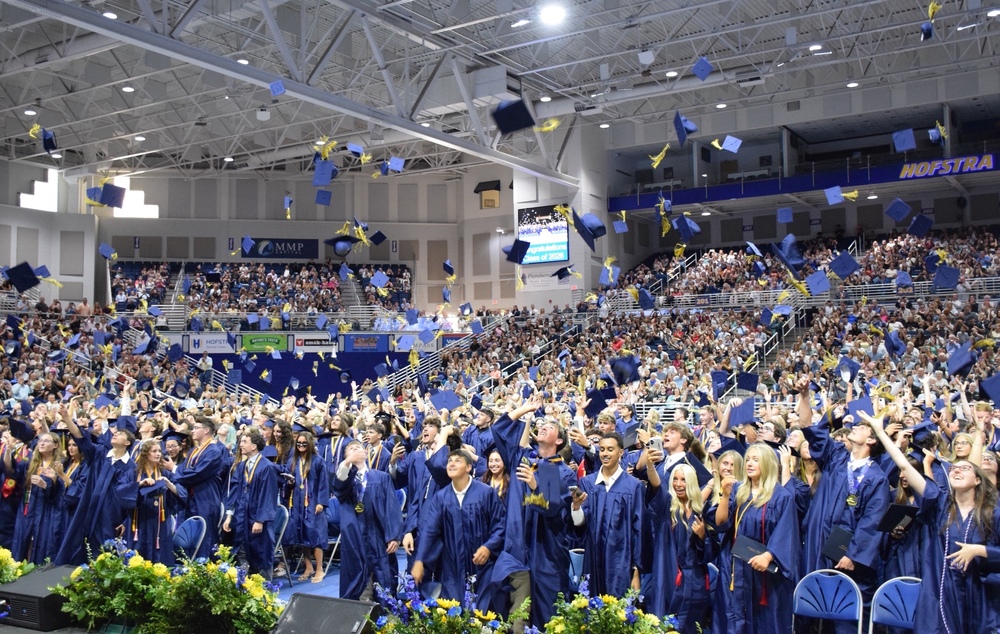 Traditional grad cap toss for the class of 2026