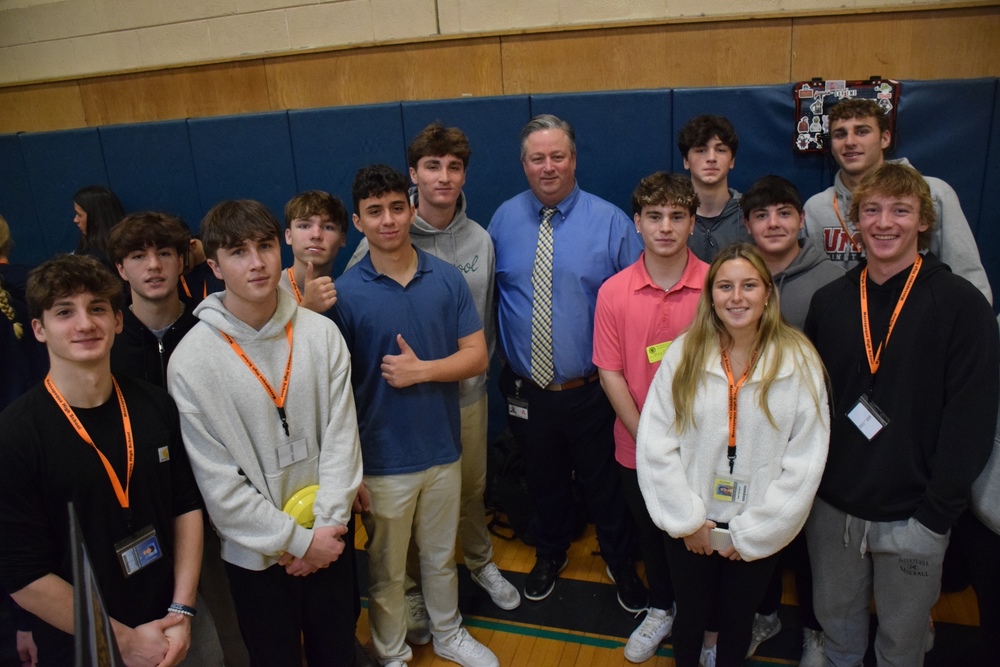 Dr. Brennan with MHS students at the annual career fair