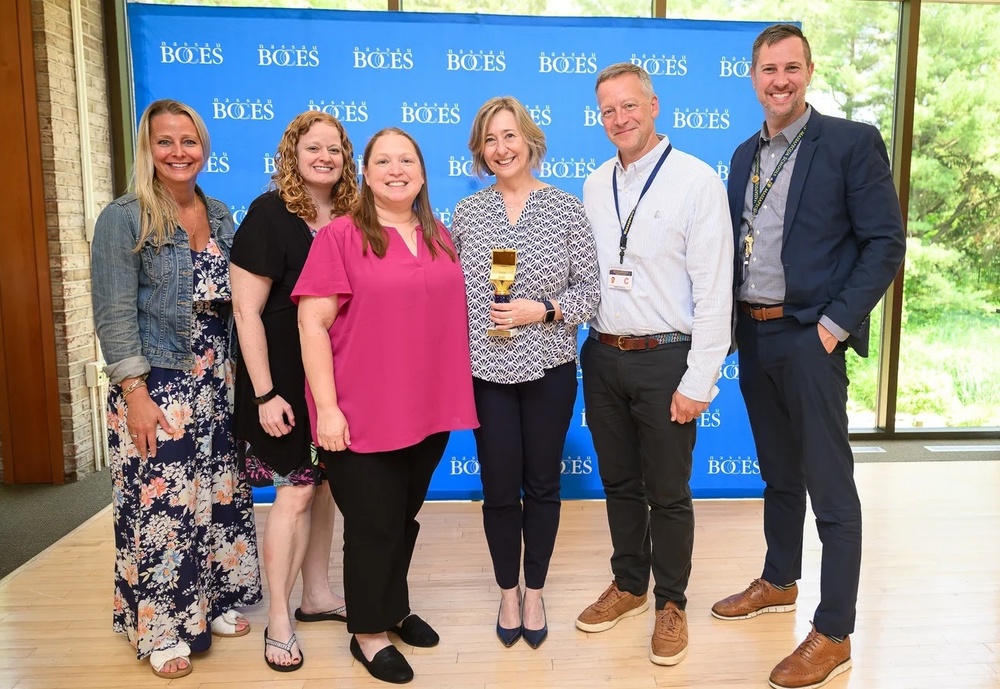 Brigitte Kahn, recipient of NASTAR Award along with MSD Tech Team
