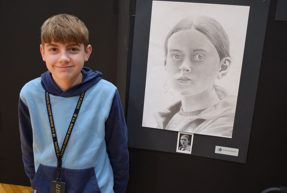 Student with Art work from the Berner Art Show