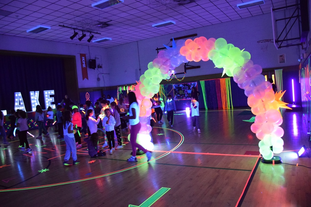 east Lake students celebrate at their anual Glow Party fundraising event