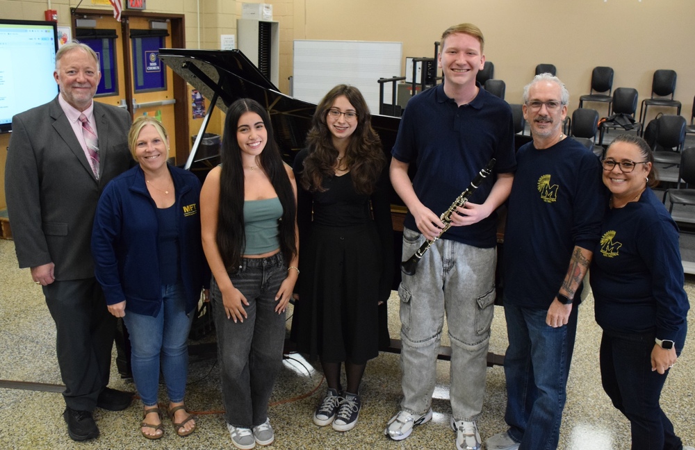Massapeuqa High School - Main Campus All state musicians with there teachers and Mr. Green, Director of Fine and Performing Arts