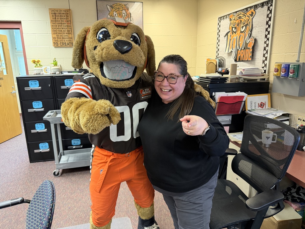 Chomp loves our secretary, Mrs. Fair!