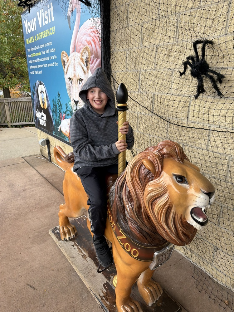 student with a lion 