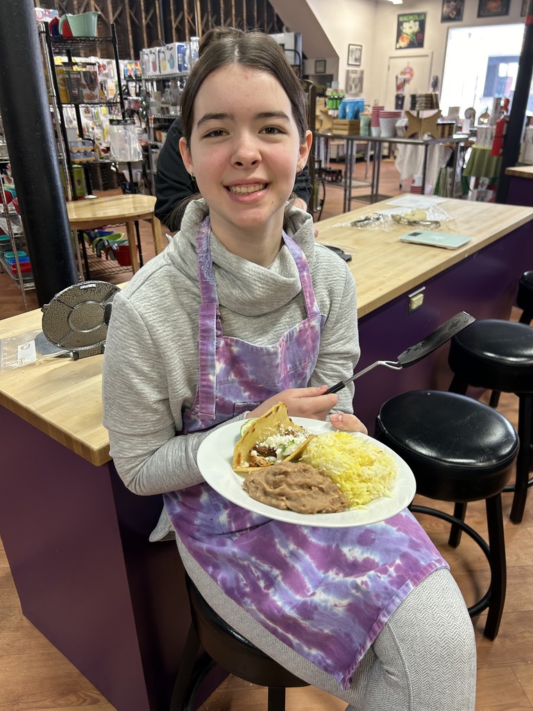 Students cooking tacos together