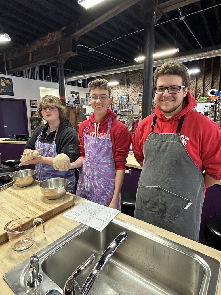 Students cooking tacos together