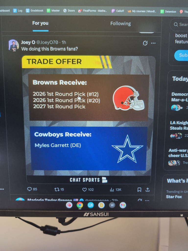 Students work on math assignments involving equations, volume, and probability in a classroom setting.