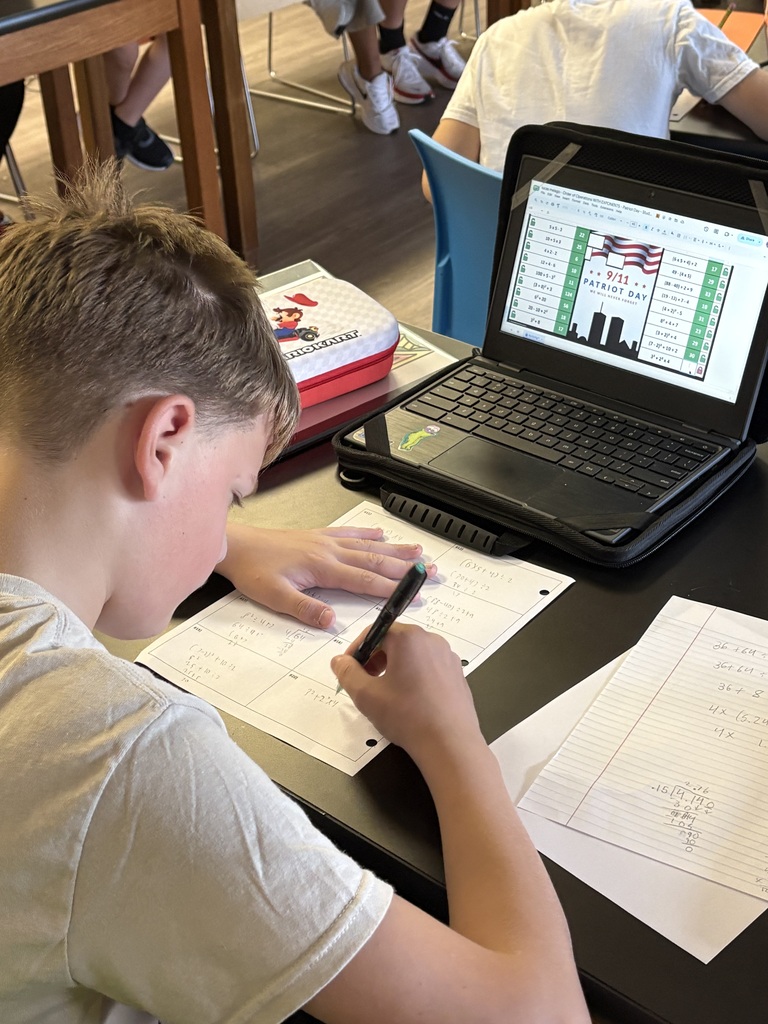 ixth- and seventh-grade students in Mrs. Konerth's math classes display math-based artwork created through order of operations pixel art and coordinate plane activities honoring Patriots' Day.