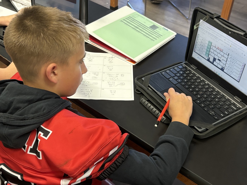 ixth- and seventh-grade students in Mrs. Konerth's math classes display math-based artwork created through order of operations pixel art and coordinate plane activities honoring Patriots' Day.