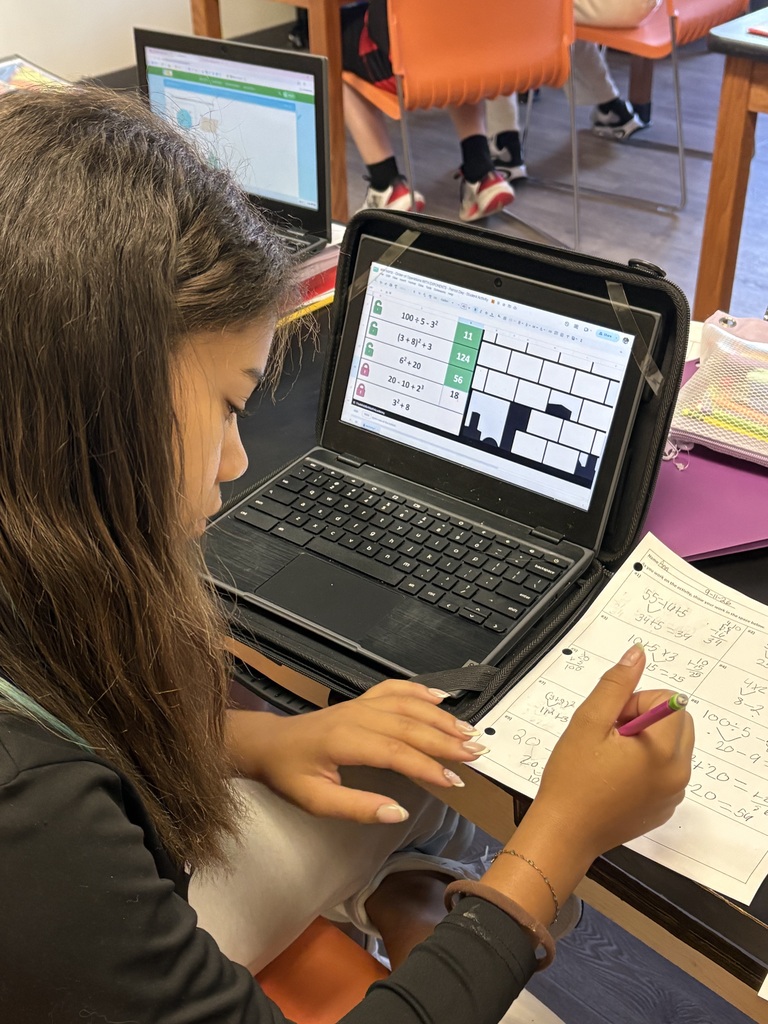 ixth- and seventh-grade students in Mrs. Konerth's math classes display math-based artwork created through order of operations pixel art and coordinate plane activities honoring Patriots' Day.