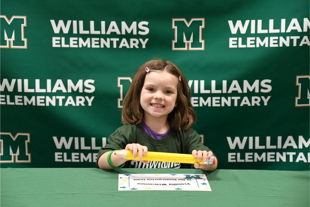 Kindergartener at signing day
