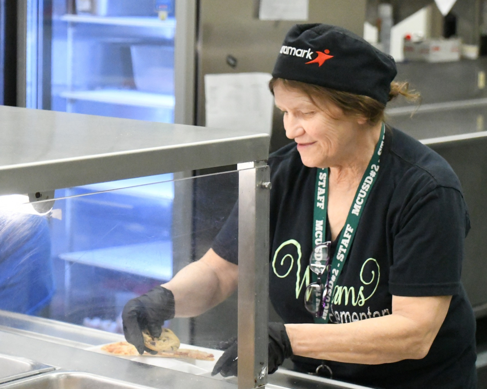 Aramark working serving food