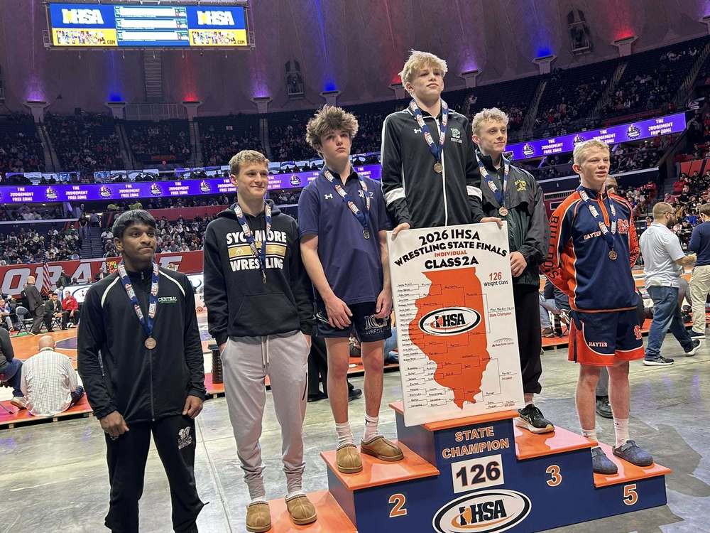 Tristan Porter on the 3rd place podium at State Wrestling.