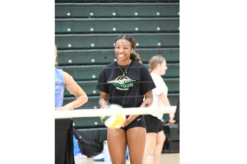 MHS youth summer camp. Student holding a volleyball