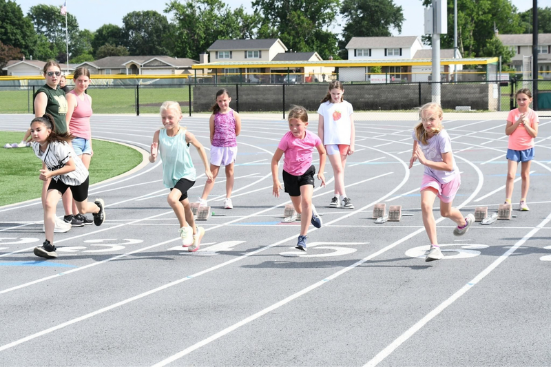 mhs youth summer camp. participants taking off on a sprint on track