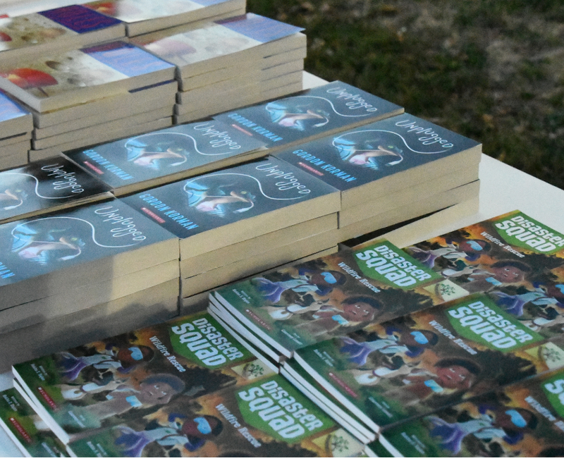 close up of books on a table at trunk or treat at Williams