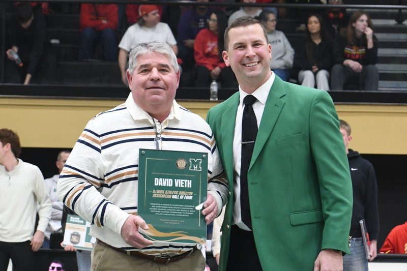 Trent Duckett with Dave Vieth presenting his recognition plaque