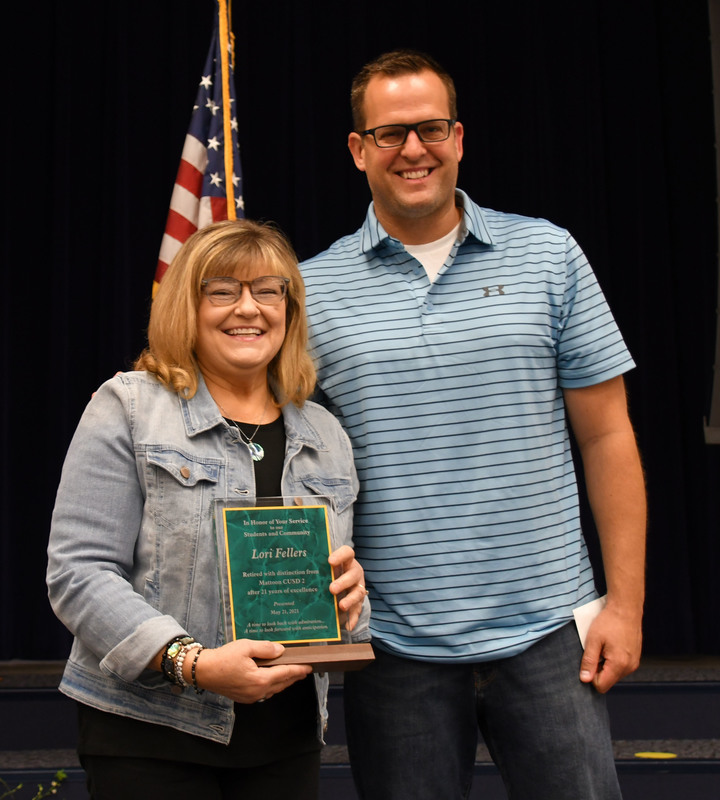 Retiree Lori Fellers, left, and Board Member John Hedges Retiree Lori Fellers, left, and Board Member John Hedges