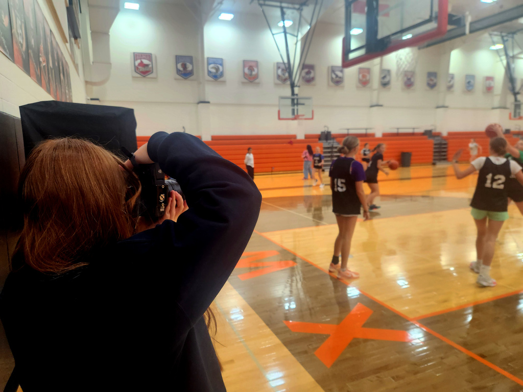 Student taking photos