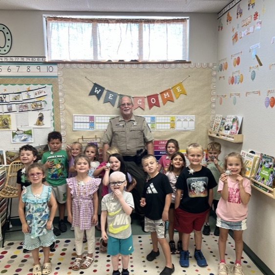 The Kindergarten class is learning about Authority Figures in the community. Mr. Owings was the guest speaker.