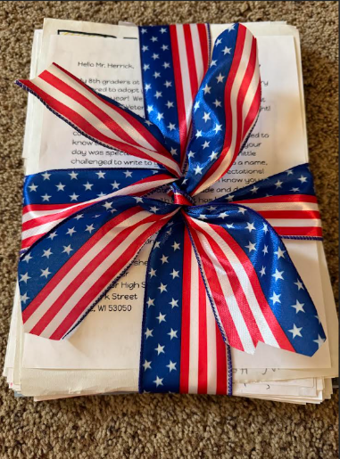 Grade 8 had the opportunity to adopt an Honor Flight Veteran this year. Mr. Dale Herrick, Vietnam Vet, flew out of Green Bay Austin Straubel Airport on November 1st. He received a letter, a poster and cards of gratitude created by our 8th graders while on his flight home from Washington D.C. on Saturday evening.  Eighth graders did a fabulous job writing to someone they did not know, showing their empathy, gratitude and appreciation to Mr. Herrick through the “Mail Call”!