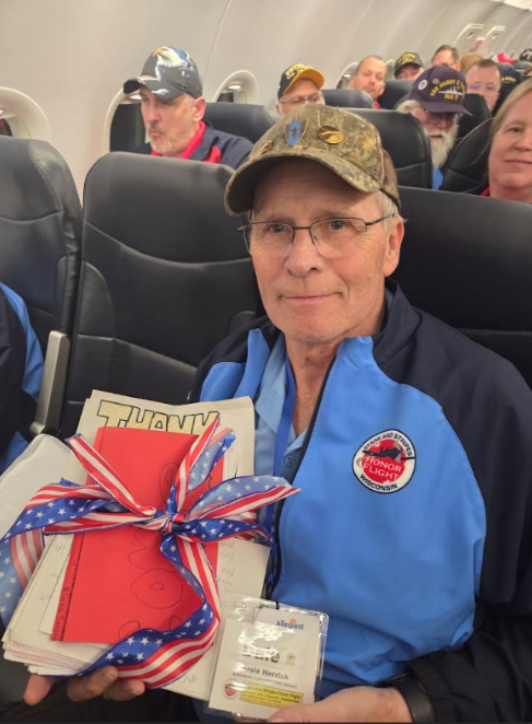 Grade 8 had the opportunity to adopt an Honor Flight Veteran this year. Mr. Dale Herrick, Vietnam Vet, flew out of Green Bay Austin Straubel Airport on November 1st. He received a letter, a poster and cards of gratitude created by our 8th graders while on his flight home from Washington D.C. on Saturday evening.  Eighth graders did a fabulous job writing to someone they did not know, showing their empathy, gratitude and appreciation to Mr. Herrick through the “Mail Call”!