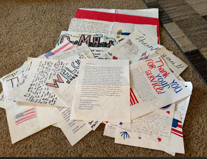 Grade 8 had the opportunity to adopt an Honor Flight Veteran this year. Mr. Dale Herrick, Vietnam Vet, flew out of Green Bay Austin Straubel Airport on November 1st. He received a letter, a poster and cards of gratitude created by our 8th graders while on his flight home from Washington D.C. on Saturday evening.  Eighth graders did a fabulous job writing to someone they did not know, showing their empathy, gratitude and appreciation to Mr. Herrick through the “Mail Call”!