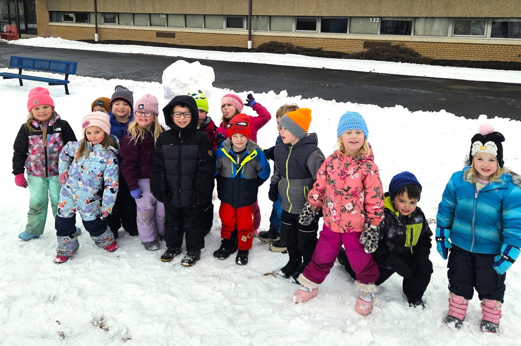 Do you want to build a snowman?! Our 4K students at the Early Learning Center had some fun on the playground today making a new friend!! #mayvillecardinals #mayvilleschools #cardinalpride