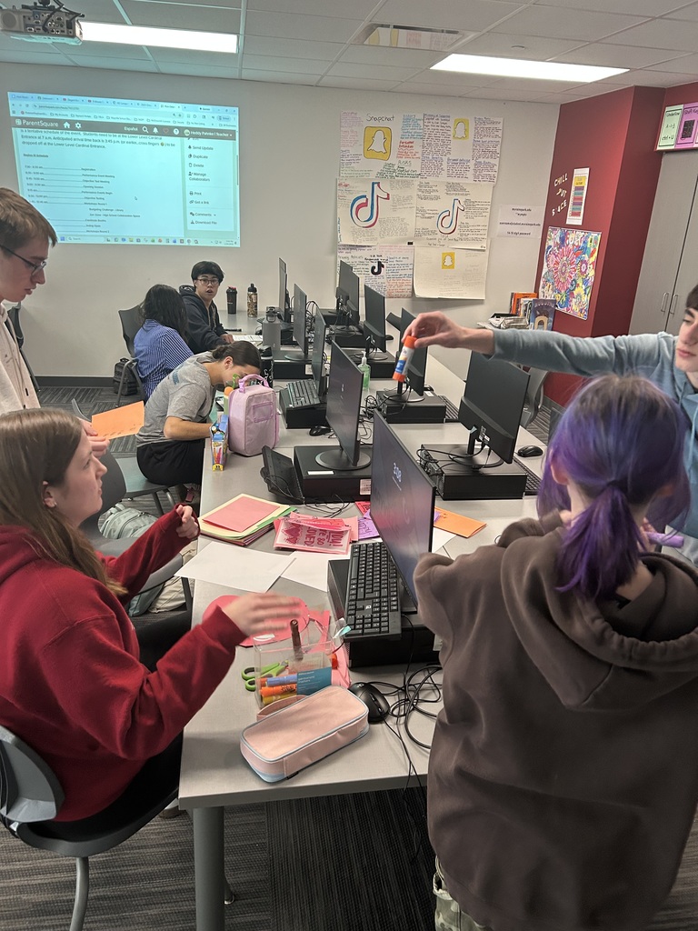 MHS FBLA visits Crossroads Care Center/Avina of Mayville to spread some Valentine's Day love to residents there. The students shared homemade cards.  Students making cards.