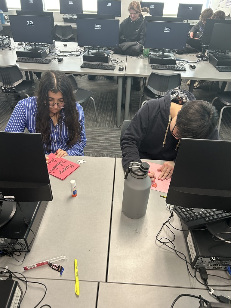 MHS FBLA visits Crossroads Care Center/Avina of Mayville to spread some Valentine's Day love to residents there. The students shared homemade cards.  Students making cards.