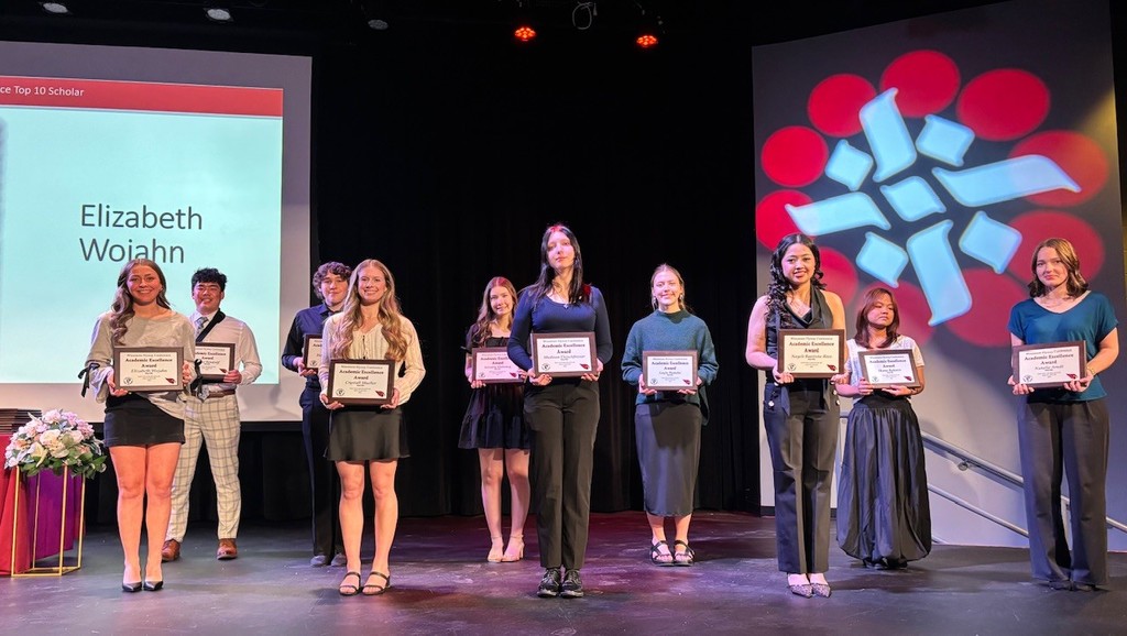 2026 MHS Flyway Academic Top 10 (group on stage)